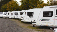 A row of parked caravans