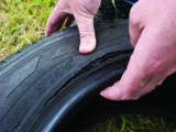 Look for cuts in the tyre sidewall, caused by impact, or anything stuck in the tread