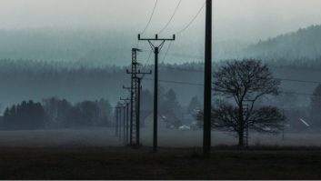 A shot of power lines on a grey day