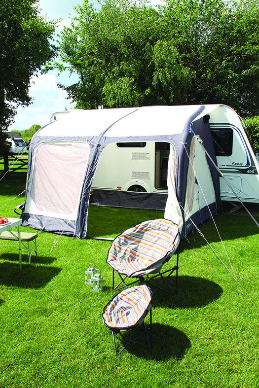 Outdoor Revolution air awning with draught skirt on side of caravan