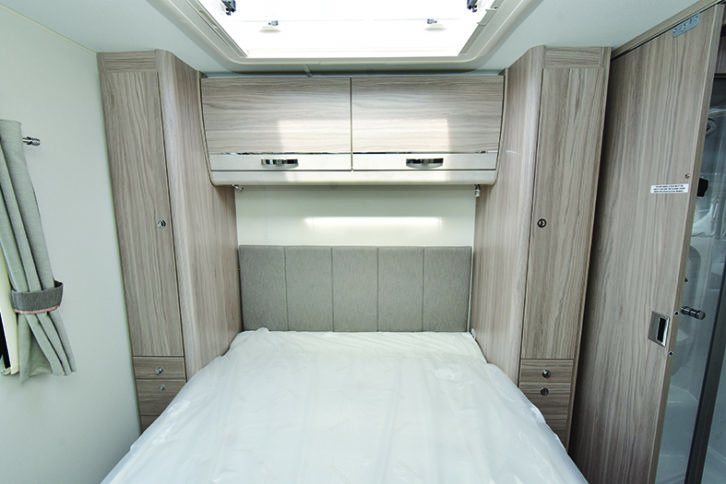 Spacious rear bedroom has twin wardrobes, and more space in cupboards and lockers