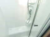 Luxurious and separate moulded shower cubicle is well lit and a good size