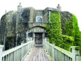 The imposing walls of Walmer Castle are reached via a bridge to the gate