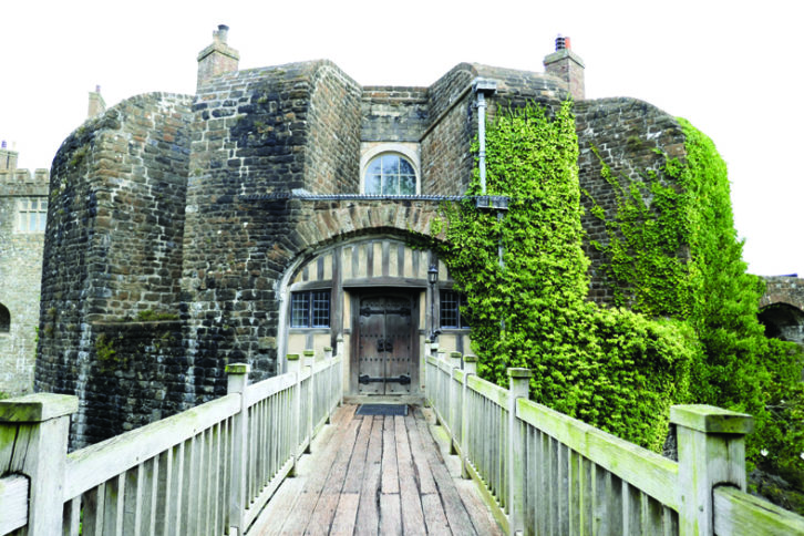 The imposing walls of Walmer Castle are reached via a bridge to the gate