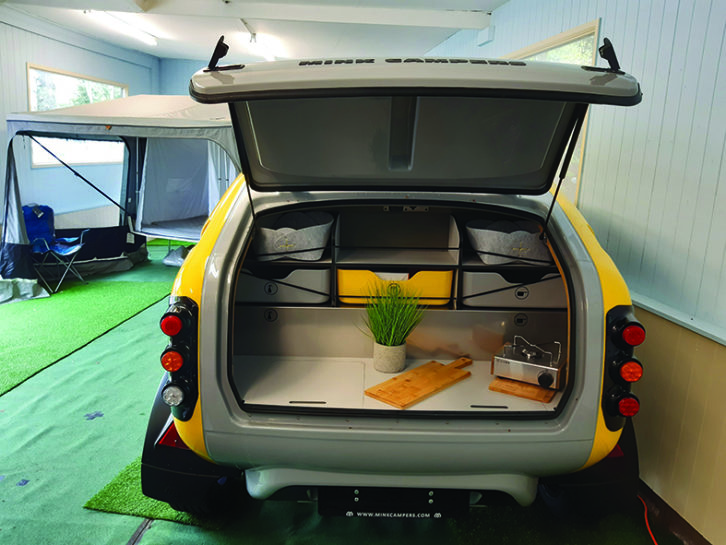 Monocoque shell helps to provide a cosy interior while the 'boot' opens up high enough to offer shelter for the chef