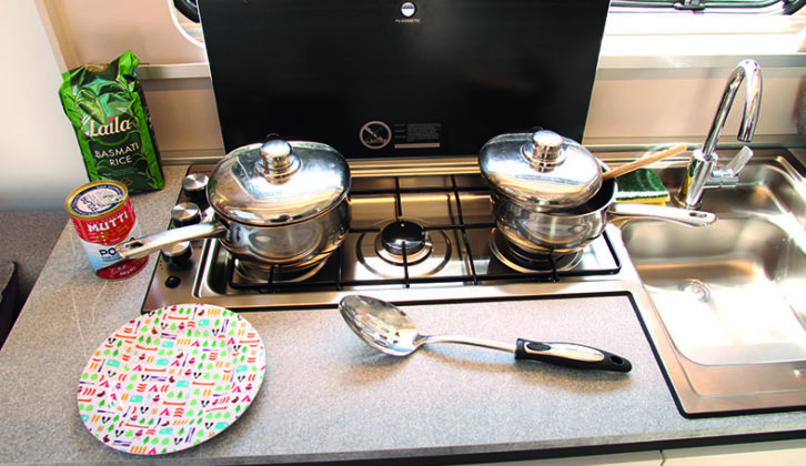 Three-in-a-row gas burners on the Dometic hob