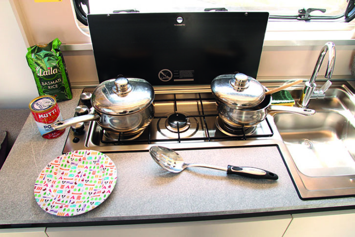 Three-in-a-row gas burners on the Dometic hob