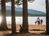 A family looking out to water