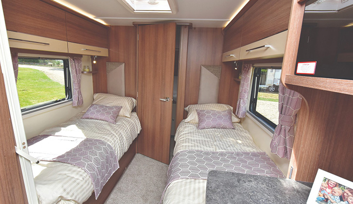 The single bed, central washroom layout in a caravan