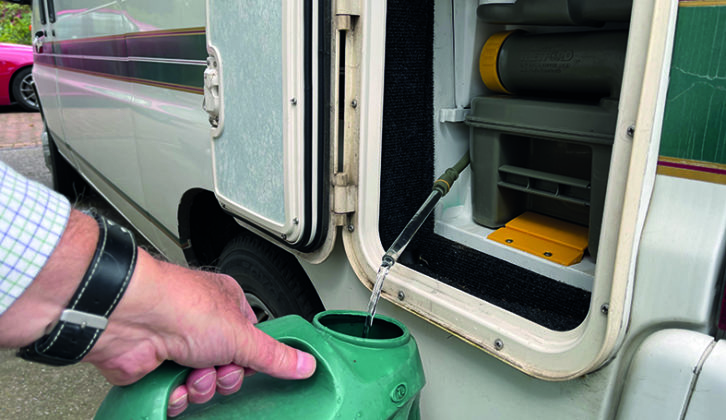 Drain the flush fluid into a suitable receptacle and dispose of properly