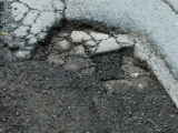 A pothole in the road