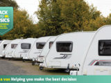 Caravans lined up on a forecourt
