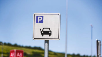 An electric vehicle charging sign