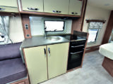 Central kitchen offers great storage and excellent amount of work surface