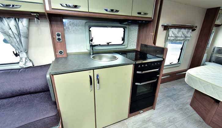 Central kitchen offers great storage and excellent amount of work surface