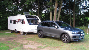 Car attached to caravan