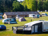 A campsite, with motorhomes and caravans pitched up