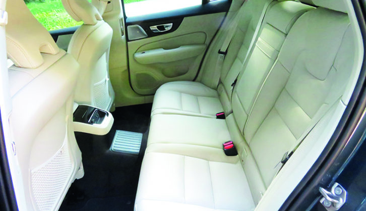 Rear seats are more comfortable for two than three, because the transmission tunnel gets in the way