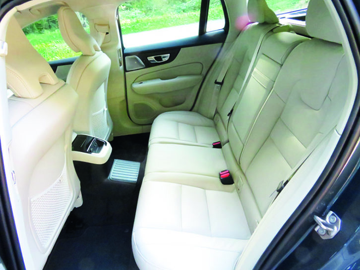 Rear seats are more comfortable for two than three, because the transmission tunnel gets in the way