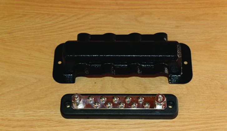 Here's a typical earthing block and cover, available from electrical retailers