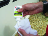 Shake the bottle and apply a small amount to a soft cotton cloth