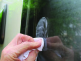 Buff the window using a circular motion and adding a little pressure, enough to remove the scratch