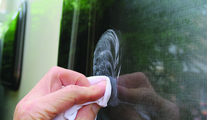Buff the window using a circular motion and adding a little pressure, enough to remove the scratch