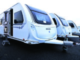 The 590UE has smooth aluminium sides and a GRP roof for storm protection