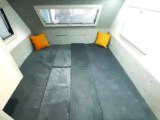 Settees make up into a 1.9m x 1.9m double bed, but base cushions are not split