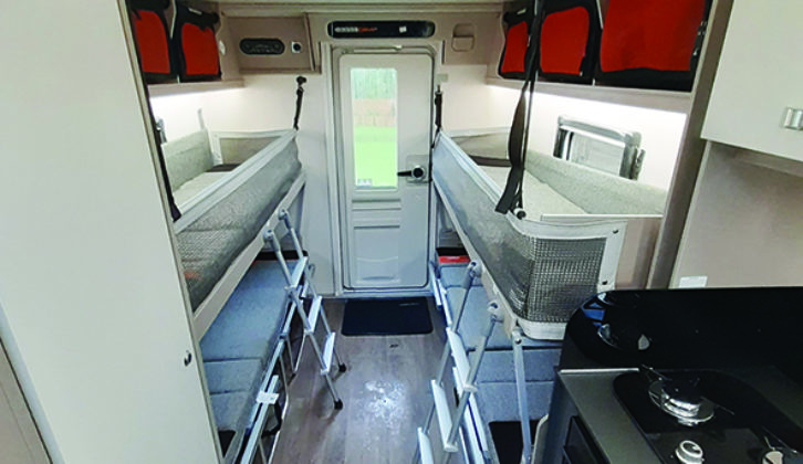 Bunk beds to the rear, and fabric 'lockers', which are removable for easy packing