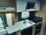The large sink takes up a good part of the kitchen worktop, but there is an extension flap
