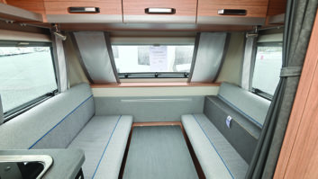 Understated upholstery, but settees make up a reasonable double bed