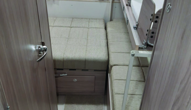 Seating in rear lounge makes up into a fairly small double, with pull-out bunk above