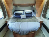 Opulent island bed at the rear is five feet wide and superbly comfortable