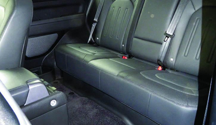 Climbing into the back does take some effort, although the front seats can be tilted and electrically adjusted