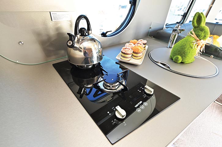 The kitchen has a Thetford two-burner hob but no oven, grill or microwave