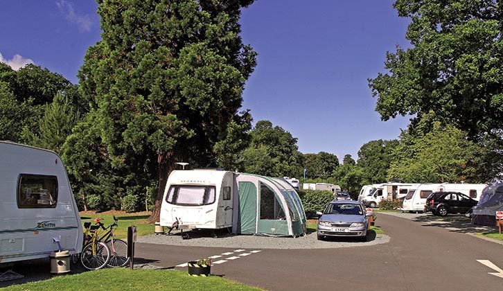A caravan pitched up at Edinburgh Caravan and Motorhome Club Campsite