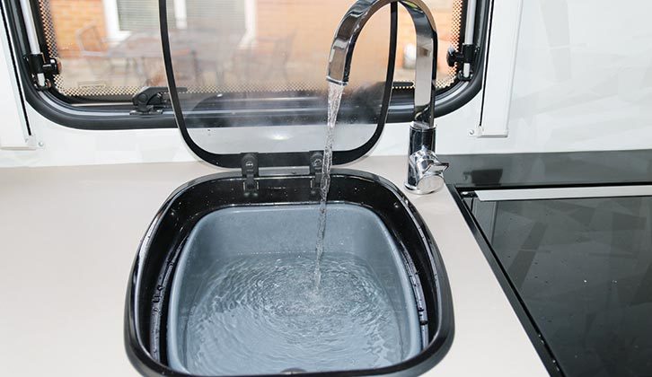 Water running from a kitchen tap