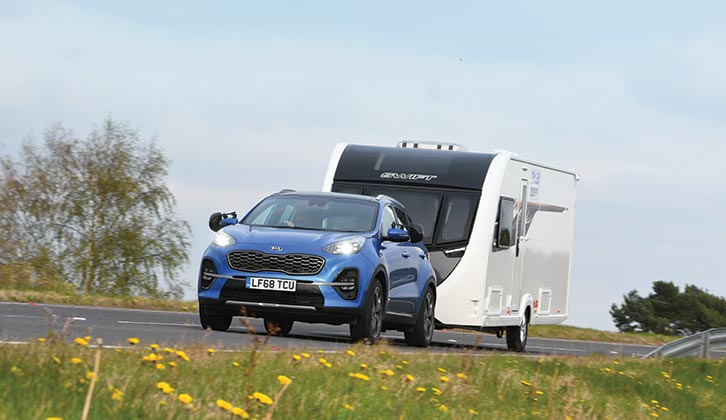 The Kia Sportage towing a Swift caravan
