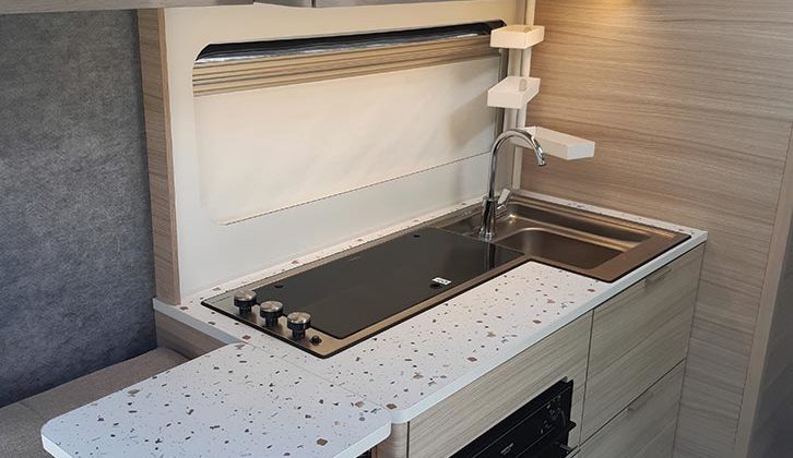 The kitchen provides a good worktop and storage