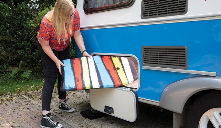 A person loading up an external locker