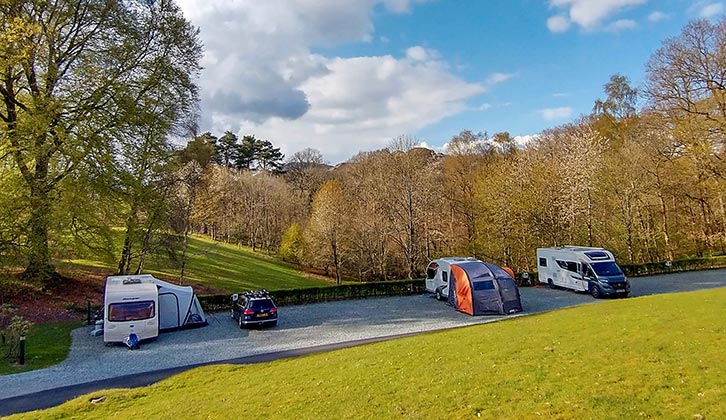 Caravans and a motorhome pitched up at Skelwith Fold