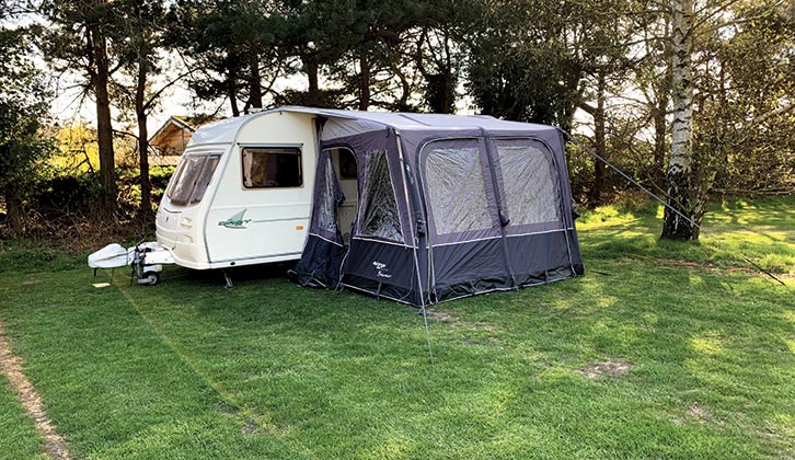 The caravan pitched up with an awning