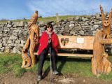 Kay takes in the view at the beautiful carved bench near Hardraw