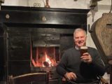 A pint by an open fire