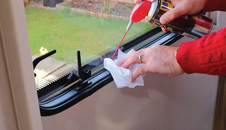 Carefully spray silicone lubricant where the window has stuck and leave to soak