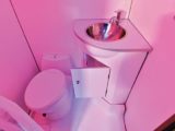 The washroom with pink ambient lighting