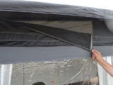 Inspecting a pre-owned awning for damage