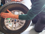A caravan tyre being checked