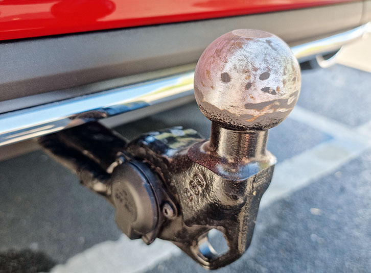 Towball and electrics are on the side of the towbar, clear of the bumper